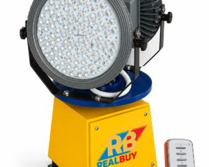 REALBUY dual-panel automatic revolving LED tower search light with yellow base and wireless remote on a white background